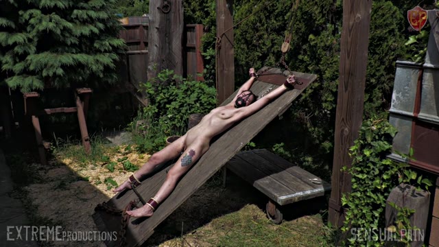 Female slave whipped on rack
