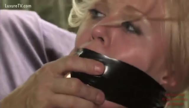 Blonde sucking her captor s cock